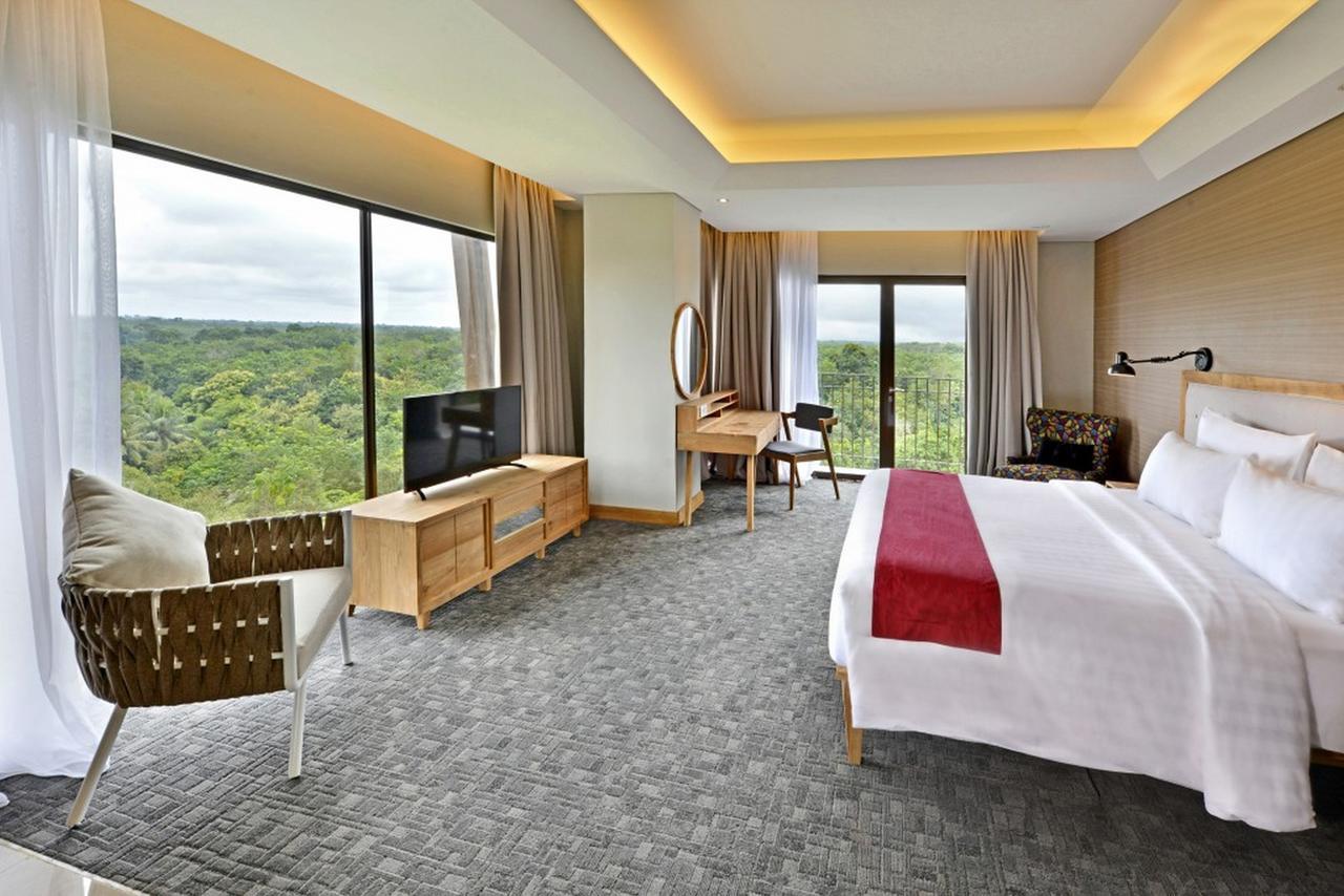 Famvida Hotel Lubuklinggau Zimmer foto