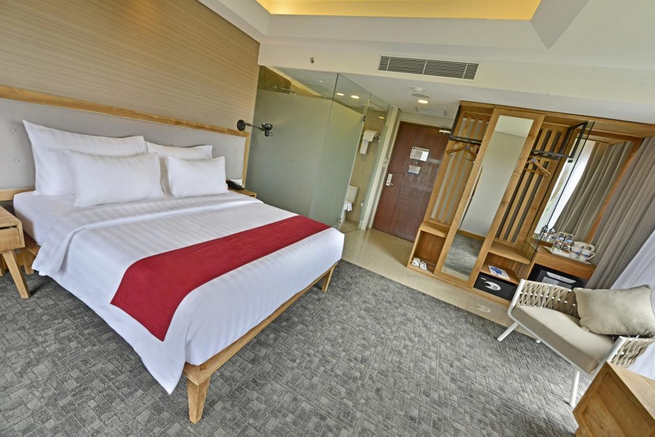 Famvida Hotel Lubuklinggau Zimmer foto