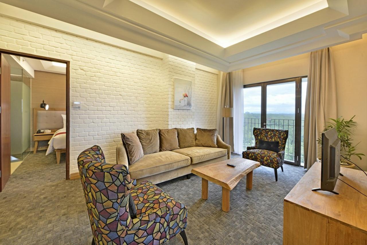 Famvida Hotel Lubuklinggau Zimmer foto